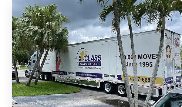 Corporate movers loading a moving truck